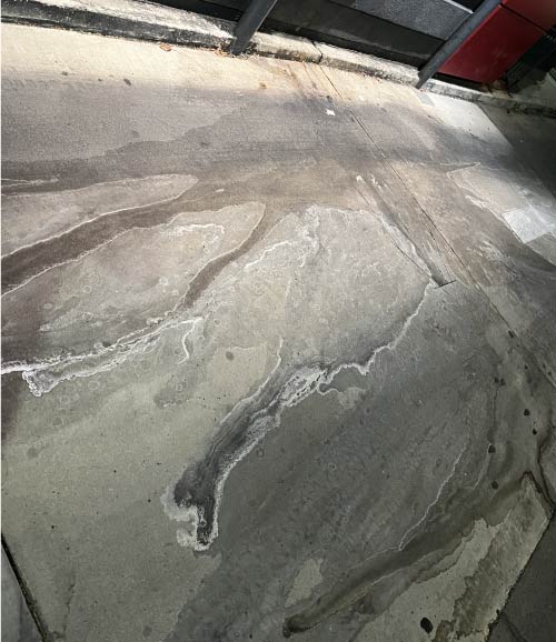 floor-cleaning dirty floor before pressure washing cleanign